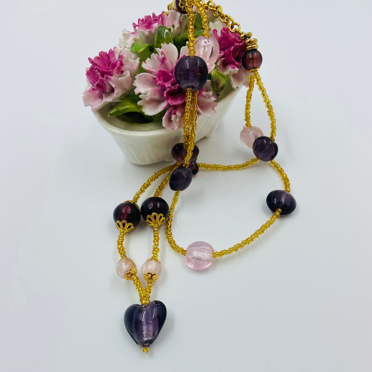 Double Strand Pink-Violet Murano beads on Czech sand beads.