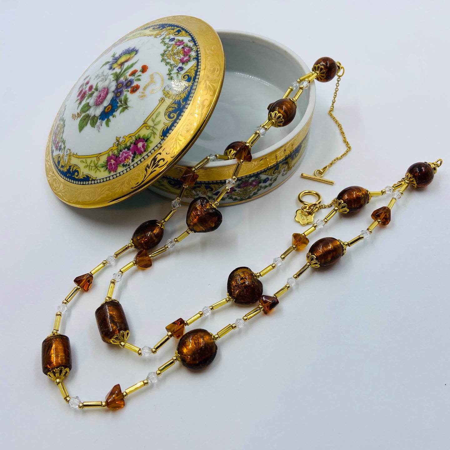 Double Strand Amberish Murano beads on Czech Bugle Beads.