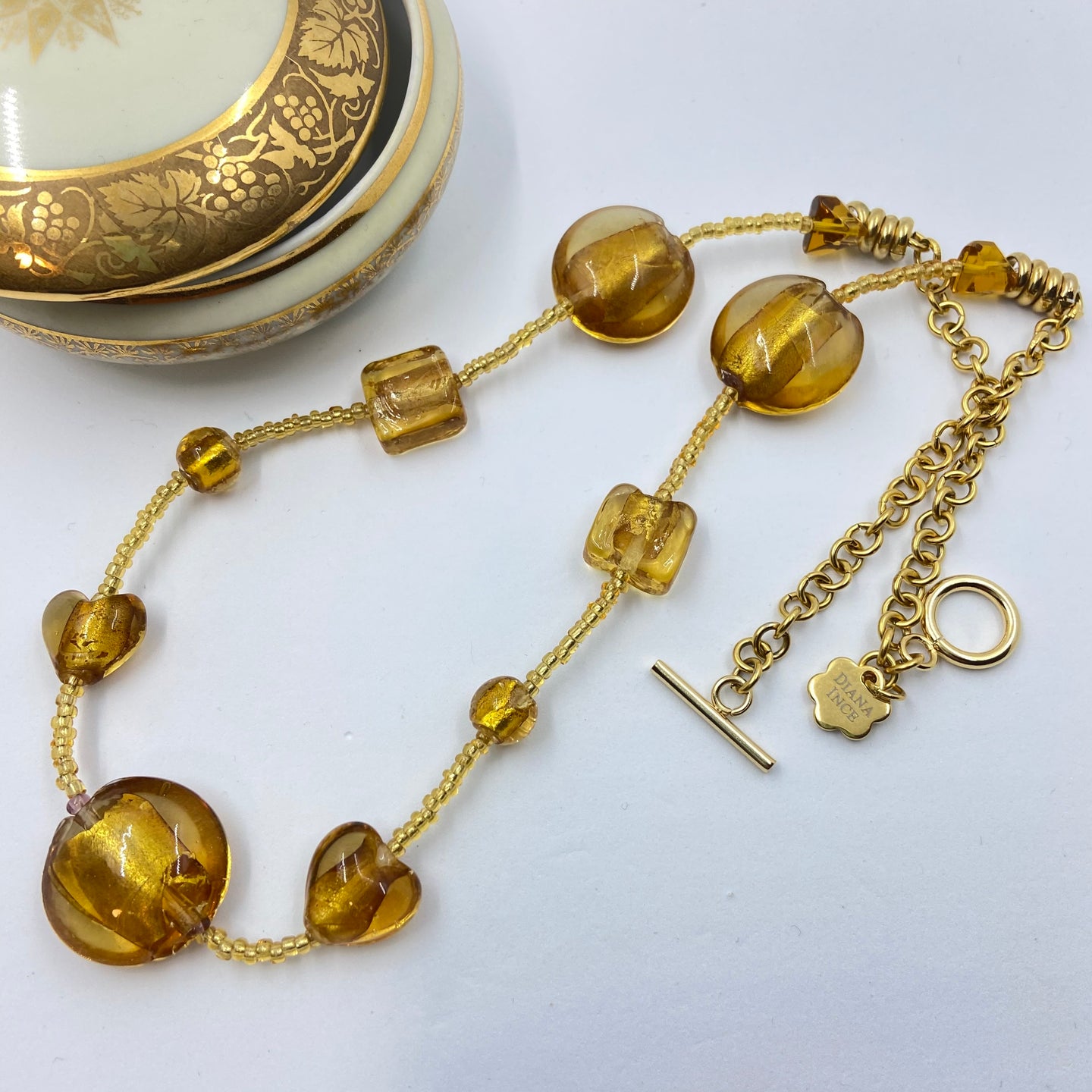 Golden Murano beads on Czech Gold Sand Beads.