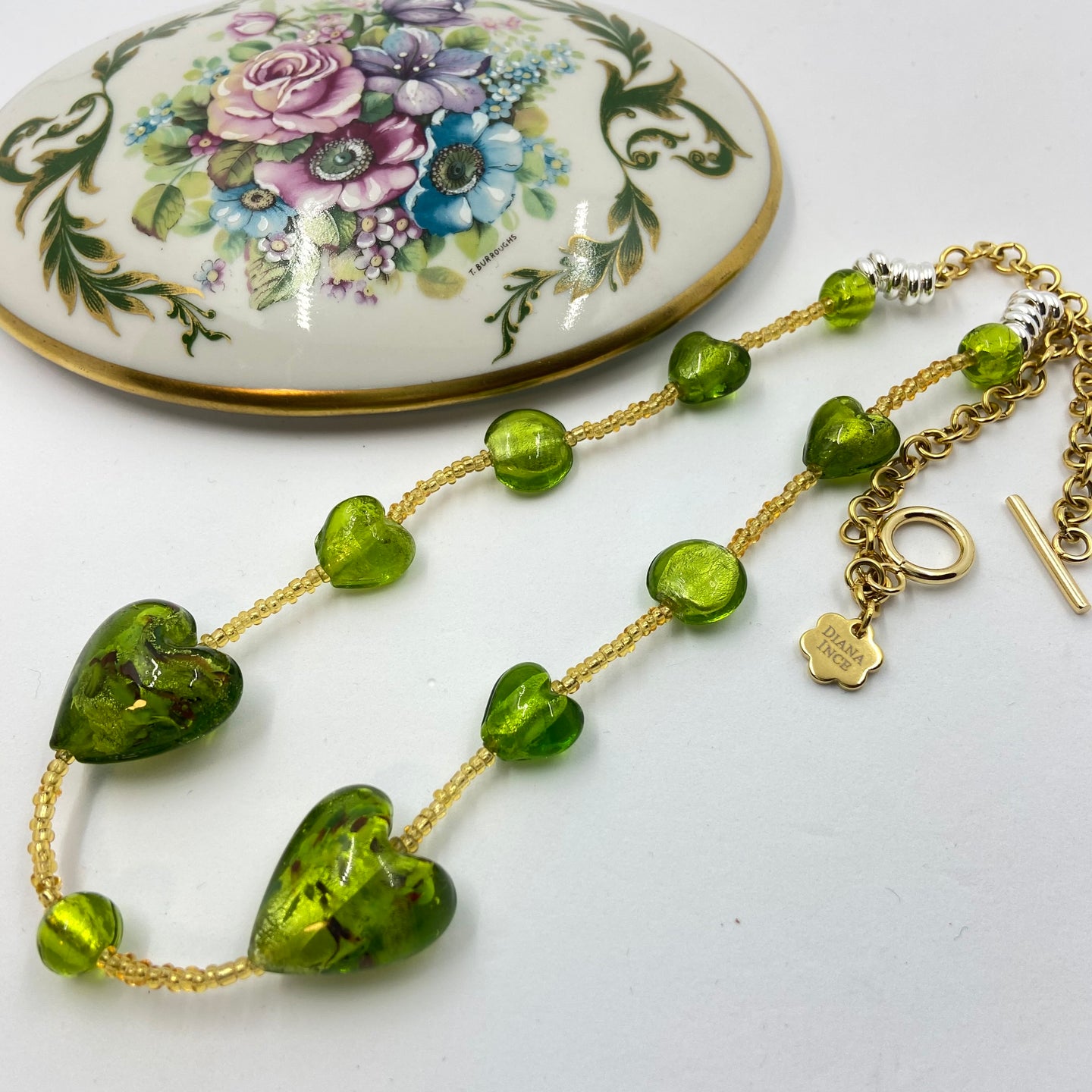 Pistachio GreenLarge Hearth  Murano beads on Czech Sand Beads.